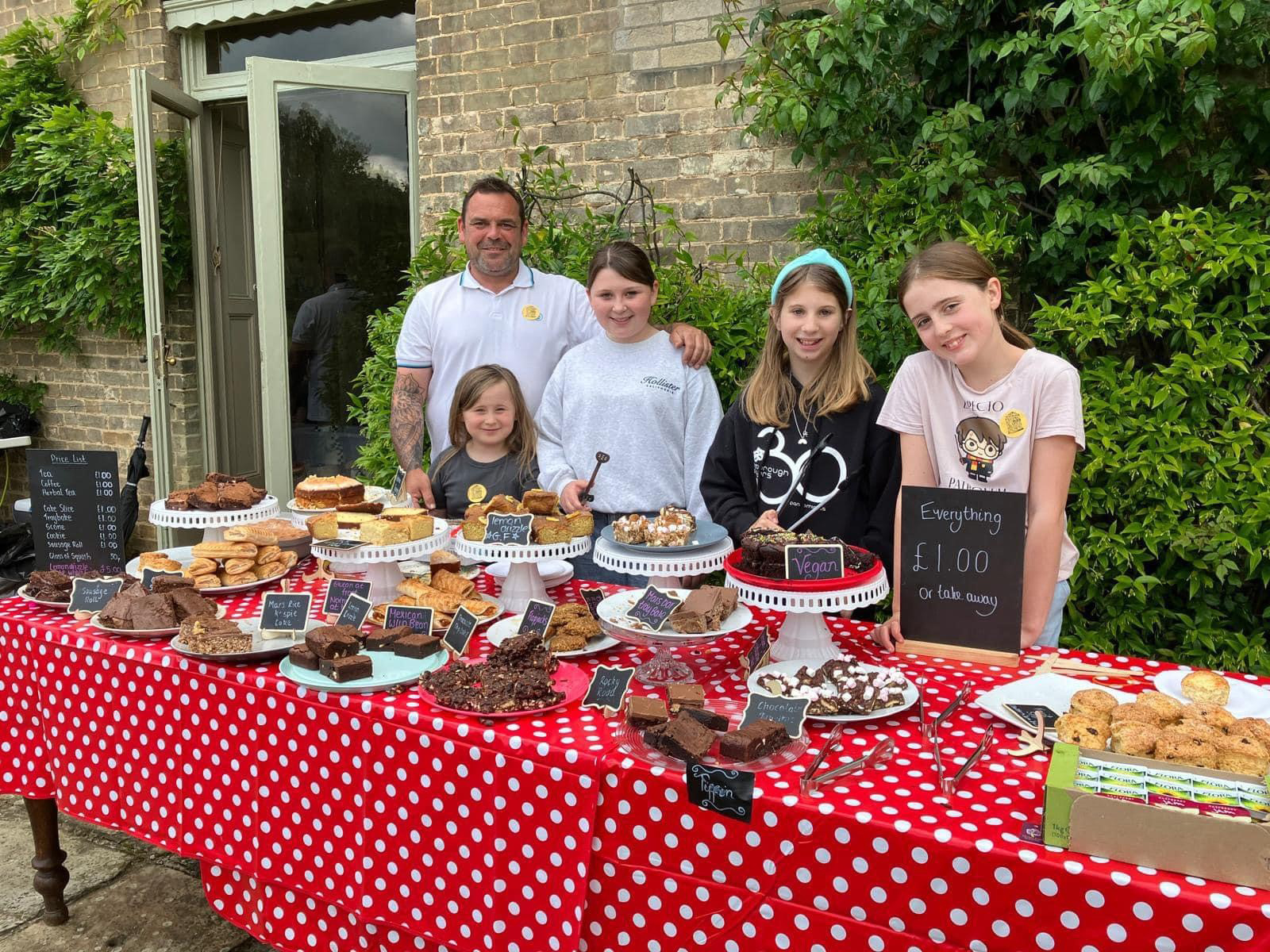 Tea’s Up!  Norfolk school’s pupils past and present deliver Bolwick Hall’s tea service